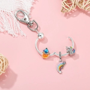 Einhorn- und Regenbogen-Schlüsselanhänger mit silberner Schlangenkette und bunten Perlen