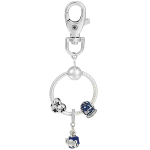 Close-up of silver star charm and blue enamel globe on snake chain keychain