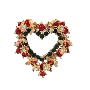 Broche de Noël en forme de cœur dorée avec strass rouges et verts et détails floraux