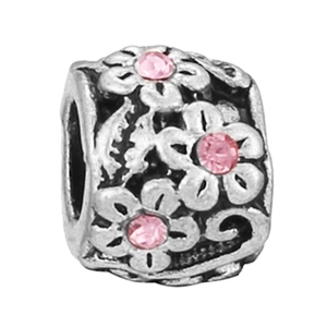 Abalorio vintage de plata con gemas rosas talladas y motivos florales en relieve para joyas