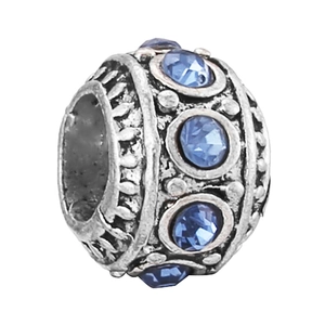 Vintage silver alloy bead charm featuring round blue crystals and embossed textures