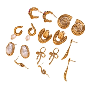 Collection of 18K gold plated geometric irregular earrings with pearls and conch designs