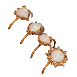 18K gold plated stainless steel opal belly rings set with heart and teardrop shapes
