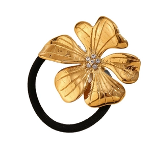 Elegant 18K gold-plated floral hair tie with sparkling crystal centerpiece on white background