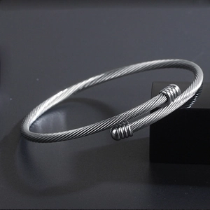 Men's minimalist cable textured open bangle in silver stainless steel with smooth end caps