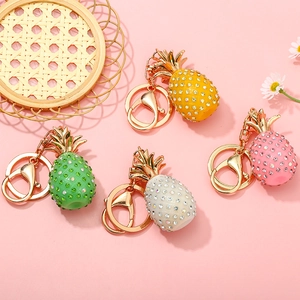 Glittering crystal pineapple keychains in four colors with gold lobster clasps and rings