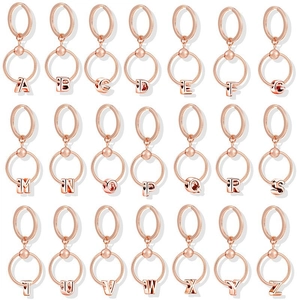 Matrix display of rose gold 3D alphabet charms on snake chain textured hoop earrings