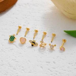 6-piece gold-plated stud earring set featuring sea turtle, bee, and planet designs
