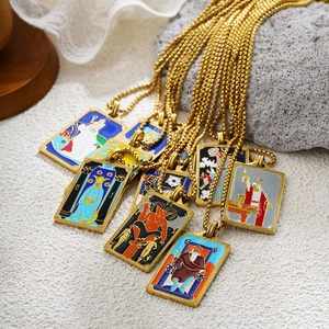 Gold tarot card pendant necklace set with colorful enamel sun and moon designs