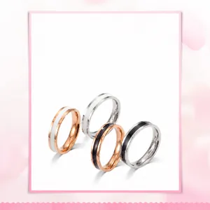 Gedetailleerde collectie minimalistische zwart-wit emaille ringen in roségoud en zilver