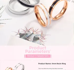 Detailoverzicht van 4mm emaille ringen in roségoud en zilverstaal met zwarte en witte lak