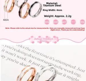 Detail van 4mm titanium stalen ringen in roségoud en zilver met zwart-wit ingelegd ontwerp