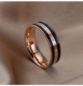 18K rose gold plated stainless steel ring with black enamel inlay and engraved text