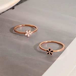 Elegant daisy rings in rose gold finish with black and white flower petals for women