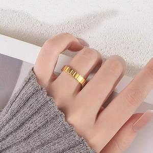 Minimalist gold ribbed ring with vertical texture for women, stylish stainless steel design
