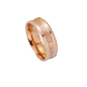 Wide rose gold stainless steel ring with BE THE CHANGE engraving and brushed finish