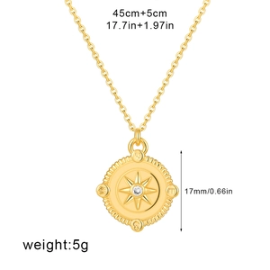 Detail of 18K gold plated compass pendant with zircon and dimensions on white background