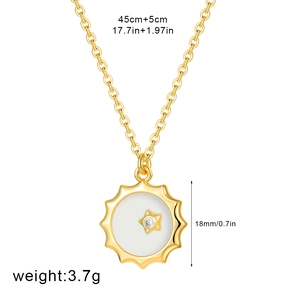 Detail of 18K gold plated compass pendant with white shell inlay and 45cm chain
