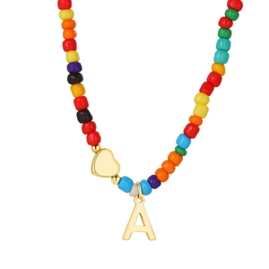 Colorful beaded necklace with 14k gold plated heart and letter A pendant on white background