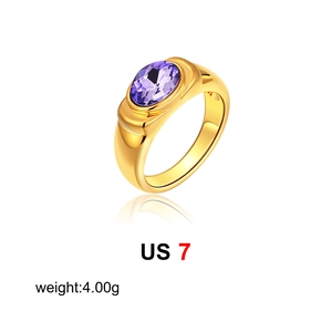 Detail of 18K gold ring with oval purple zircon stone and US 7 size weight 4g tag