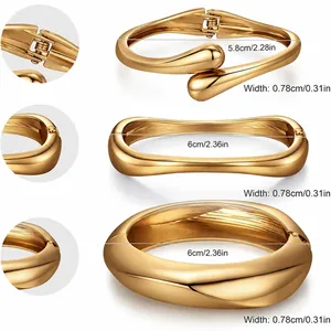 Three-piece set of 14K gold plated alloy spring bangles with detailed size chart