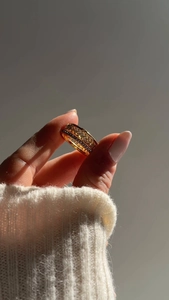 Detail shot of 18K gold plated zircon ring set featuring vintage pavé stacking bands