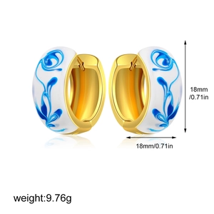 Detail view of 18mm blue and white enamel hoop earrings with weight and size markings