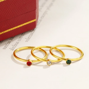Three-piece stackable gold rings with colorful round-cut zircon stones in red white and green