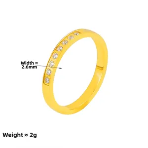 Gold plated titanium steel ring with 10 round white stones, width 2.6mm and weight 2g