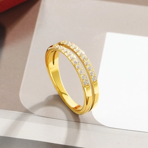 Macro shot of double-layer gold titanium steel ring featuring parallel zircon inlay detail