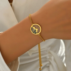 Gold mountain shell disc bracelet with Your Faith Can Move Mountains engraving