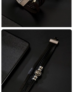 Macro detail of men's multilayer punk bracelet with skull metal accents and leather weave