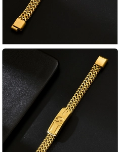Macro detail of gold stainless steel woven chain bracelet with an infinity totem plaque.