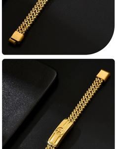 Close-up of gold woven stainless steel bracelet with cross and anchor religious emblem