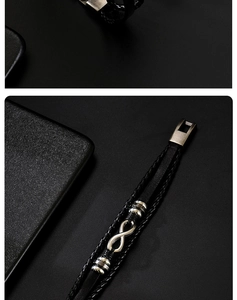 Macro shot of men's leather braided bracelet with silver infinity symbol and push clasp