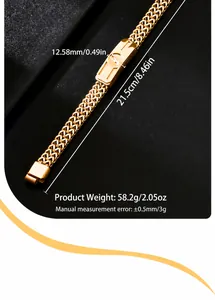 Detail of 12.5mm gold Cuban link bracelet with engraved totem on matte leather background