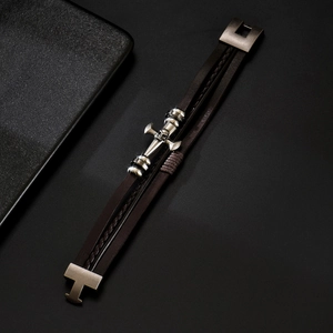 Men's multi-layer braided brown leather punk bracelet featuring skull and cross metal charms