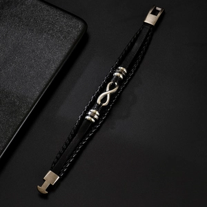 Men's black braided leather bracelet featuring a silver infinity charm and metal clasp