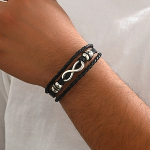 Men's multi-layer black braided leather bracelet featuring a silver infinity charm