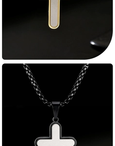 Detail of cross pendant showing black stainless steel edges and matte silver texture