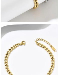 Detail of gold stainless steel Cuban chain bracelet with lobster clasp and adjustable link