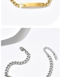 Detailed macro of stainless steel link chain with lobster clasp and S. Steel tag