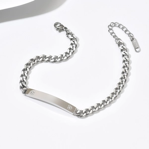 Polished stainless steel Cuban chain bracelet with heart engraving and small crystals