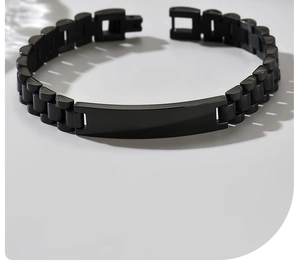 Macro shot of matte black stainless steel link bracelet with engravable identity plaque