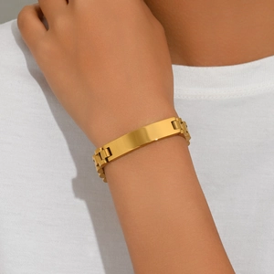 Minimalist gold tone watchband style titanium steel bracelet for men worn on wrist