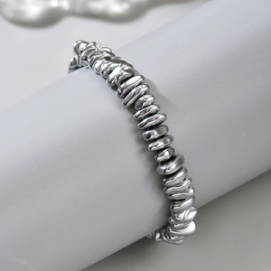 Bracciale a sfere in acciaio al titanio argento lucido con perline metalliche irregolari