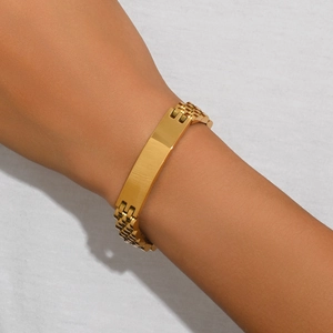 Bracciale in acciaio al titanio dorato lucido con piastrina ID rettangolare e maglia orologio