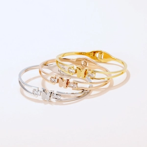 Three-piece butterfly stainless steel cuff bracelet set in gold, rose gold and silver