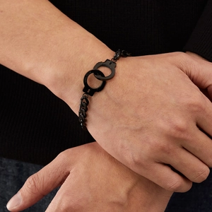 Black stainless steel handcuff bracelet with UNLOCK engraving and thick Cuban link chain