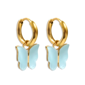 Detail view of light blue enamel butterfly drop earrings with golden metal hoop closures
